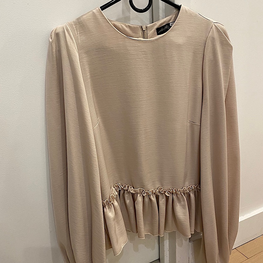 Balloon sleeve peplum top from Century 21